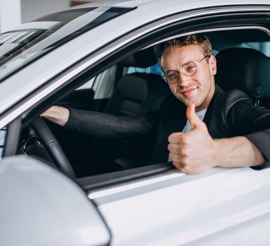 handsome man sitting car
